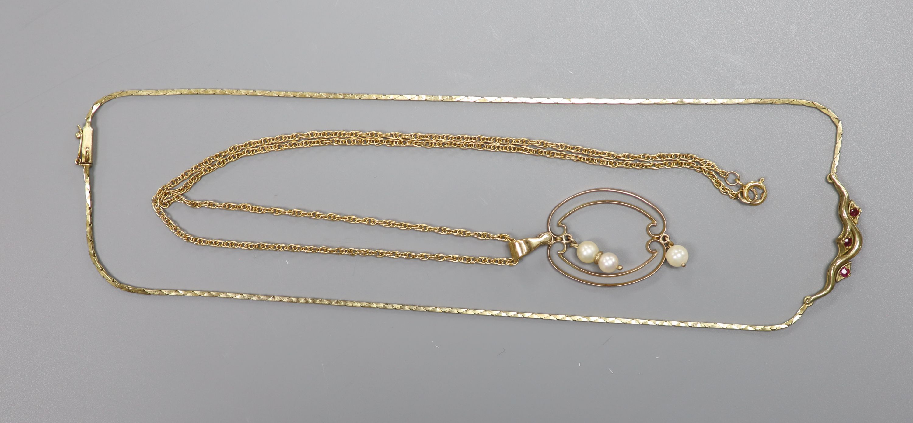 Two modern 9ct and gem set necklaces, one with 9ct cultured pearl set pendant, 35mm